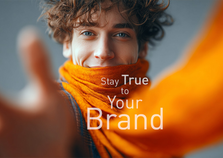 Being in sync with your brand is cool – orange scarf as a custom-made promotional textile